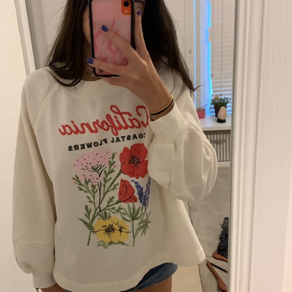 Cream colored sweater with coastal flowers from Old Navy size medium